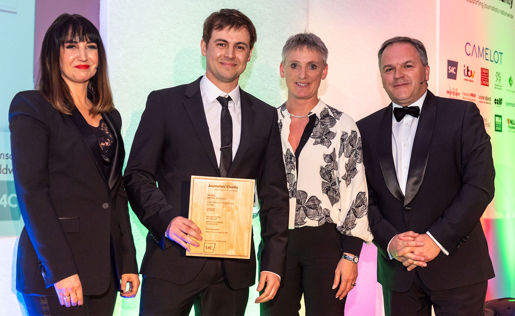 Will Hayward holding a Wales Media award - Credit credit Natasha Hirst Photography